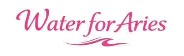 Logo of a center for autism with pink text and a ribbon.