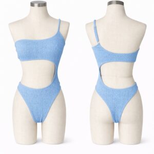 Light blue ribbed cut-out swimsuit with asymmetrical straps.