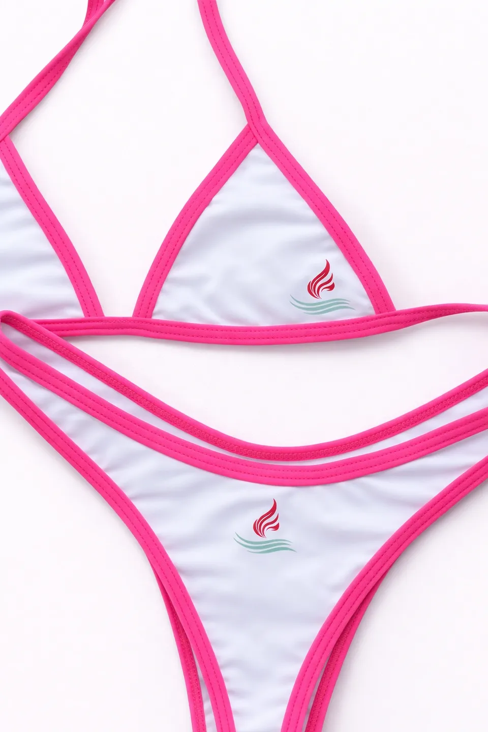 White bikini with pink trim and small flamingo logo.